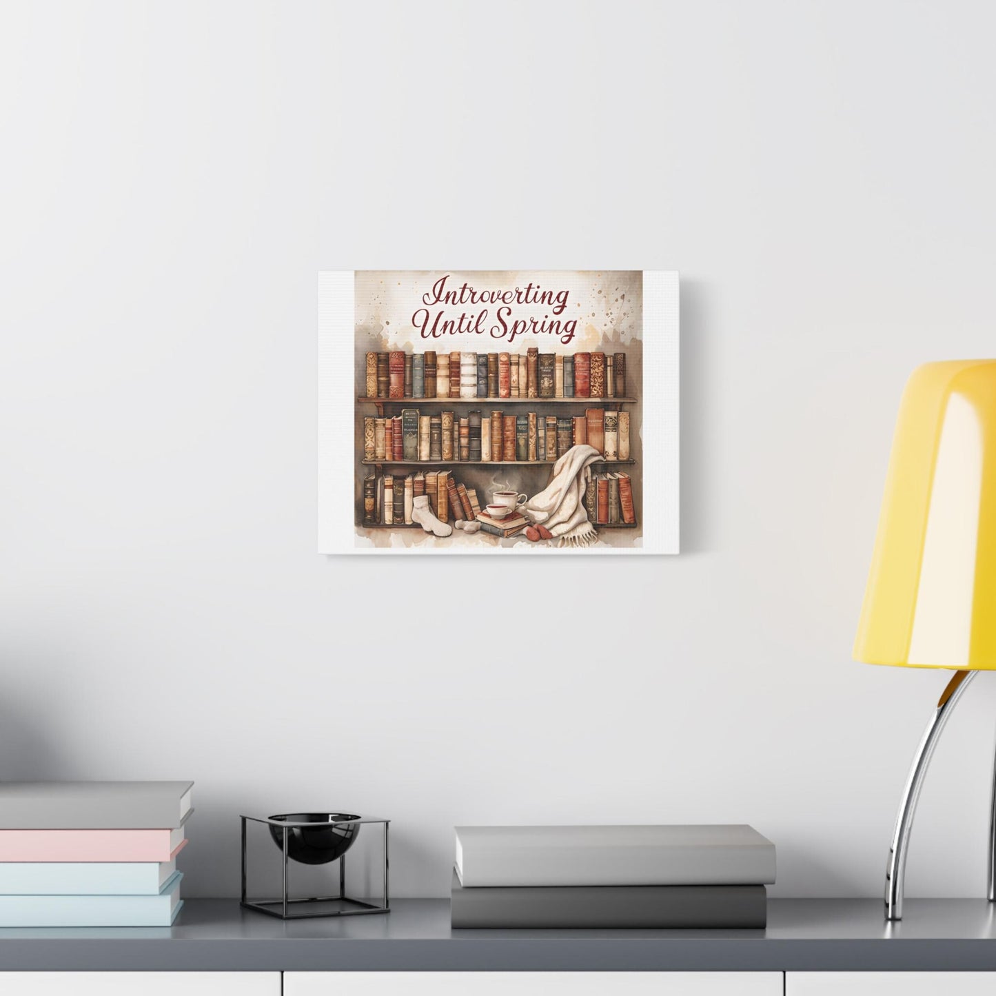 Cozy Bookshelf Canvas Art: Introverting Until Spring Quote